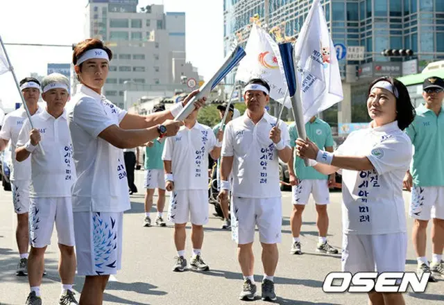 「アジア大会2014韓国仁川」聖火リレーに参加した「ZE:A」ドンジュン