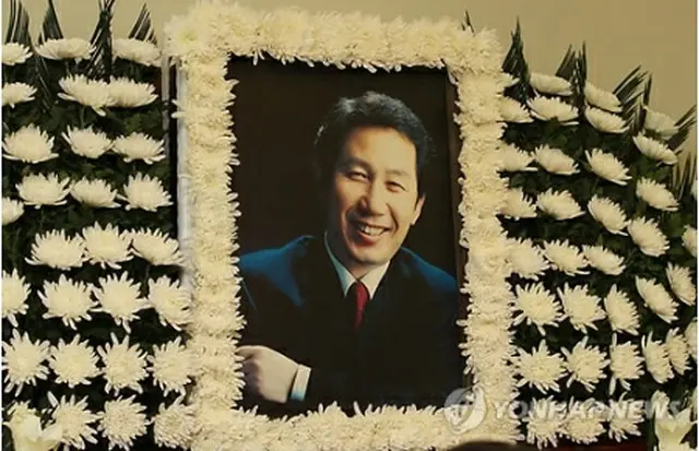 死去した金槿泰氏の写真＝30日、ソウル（聯合ニュース）