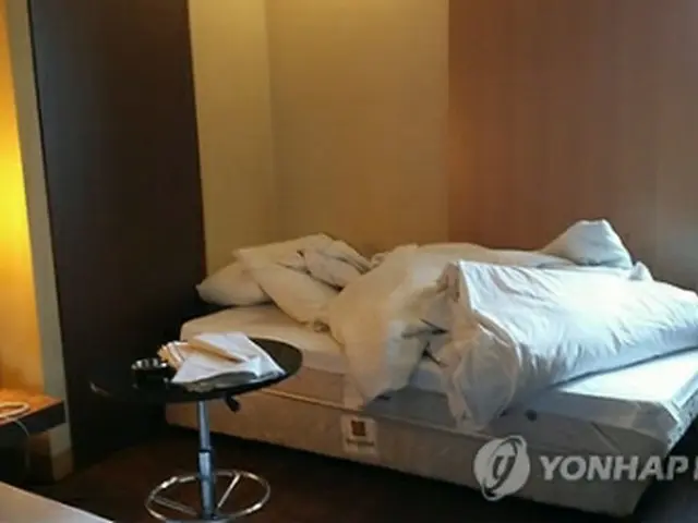 朝鮮族の男性が自殺を図ったホテルの客室＝（聯合ニュース）
