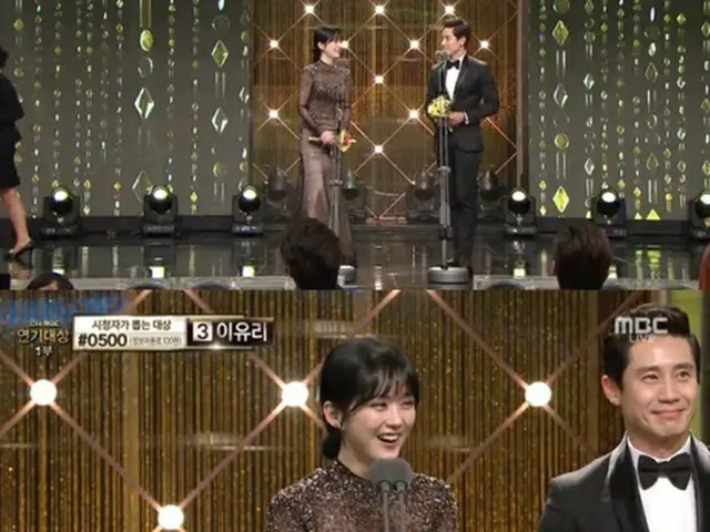 韓国俳優シン・ハギュンと女優チャン・ナラが「2014MBC演技大賞」で人気賞を受賞した。（提供:OSEN）