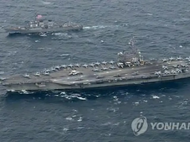 韓国の東の海上で１８日、演習を行う米原子力空母ロナルド・レーガン（米海軍提供）＝（聯合ニュース）