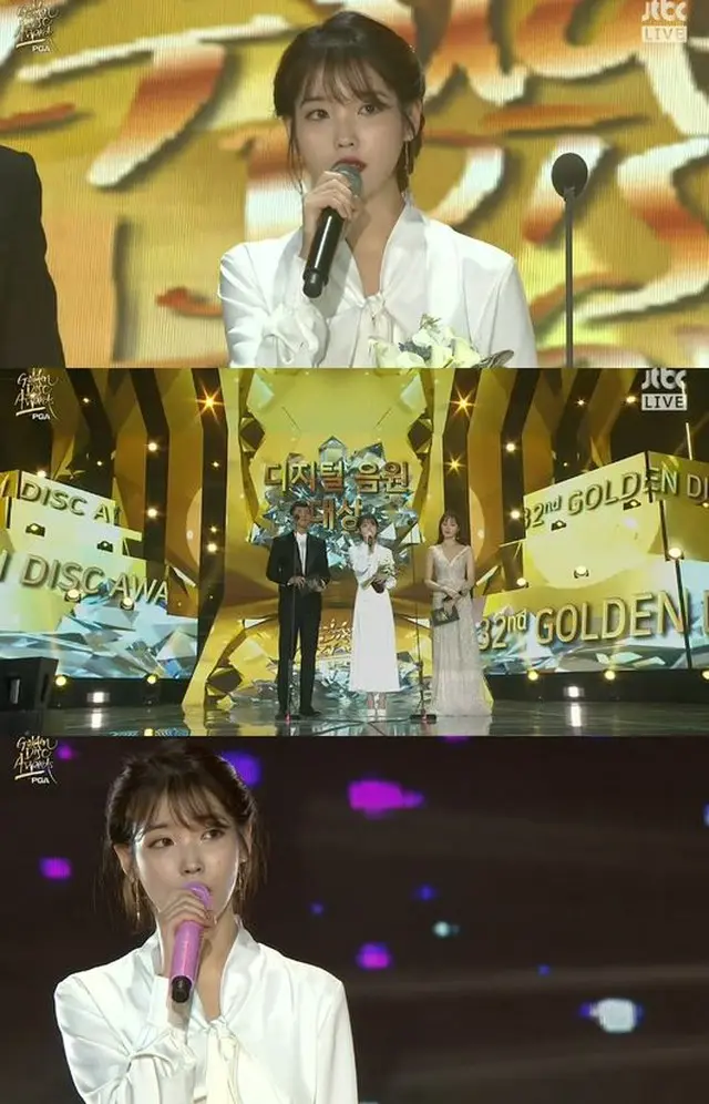 韓国歌手IU（アイユー）が、デビュー10年で初めてゴールデンディスク大賞を受賞した。しかしIUは喜びよりも故ジョンヒョン（SHINee）を哀悼し、意義深いコメントを残した。（提供:OSEN）