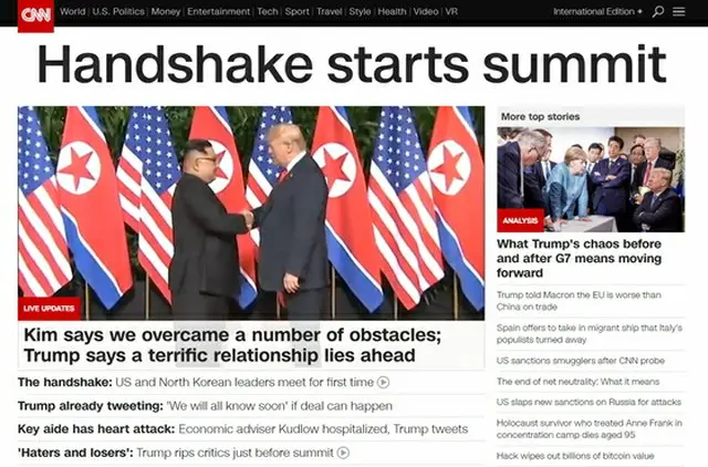＜米朝会談＞トランプ大統領－金委員長の”歴史的な握手”、「見たことがない」と海外メディアも興奮（提供:news1）