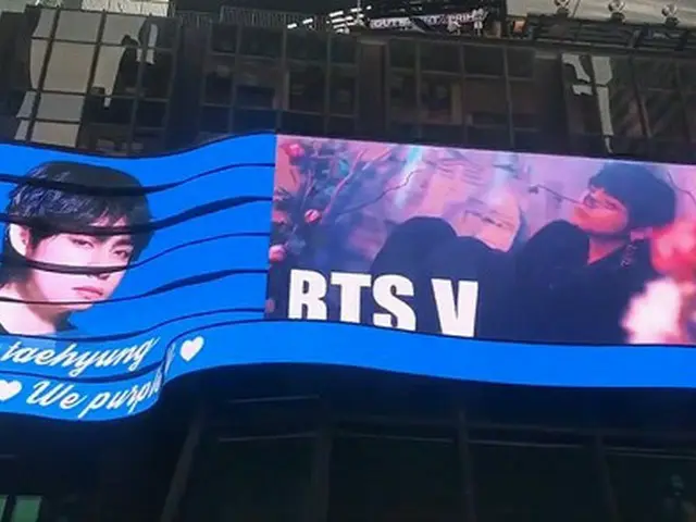 韓国ボーイズグループ「防弾少年団」メンバーのVが、世界中の芸能人でも初となる、ニューヨーク・タイムズスクエアのABC Supersign LED広告板に個人広告を出し、注目を集めている。（写真提供:OSEN）