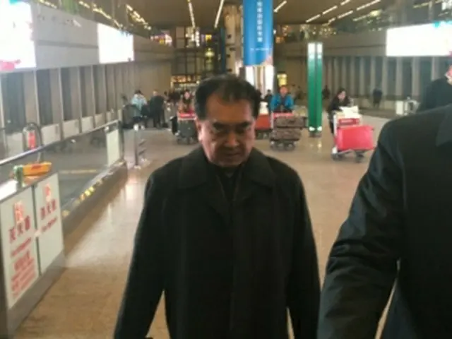 北京空港に到着したキム氏=15日、北京(聯合ニュース)
