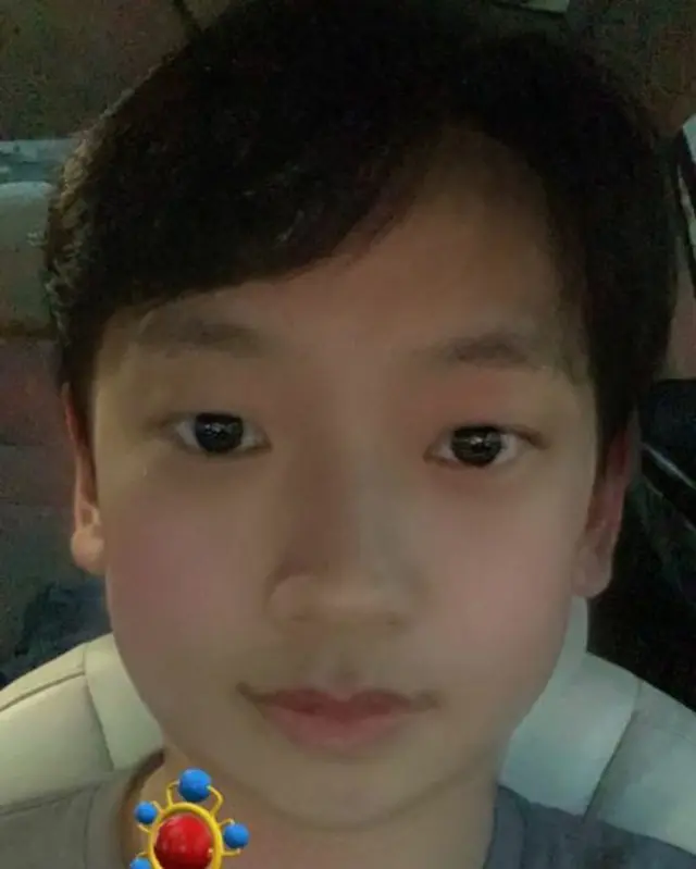 歌手で俳優のRain（ピ）が、子供顔になるアプリで撮った写真を公開した。（提供:OSEN）