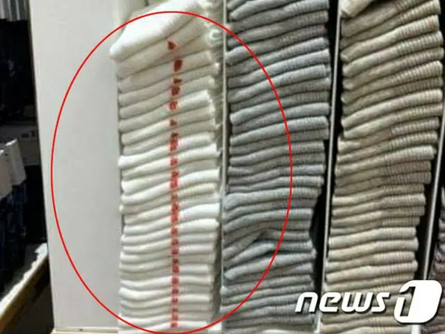 韓国・京畿道（キョンギド）水原（スウォン）地域にある日本企業の衣類店で陳列された商品を故意に毀損した40代の女性が警察に逮捕された。（提供:news1）