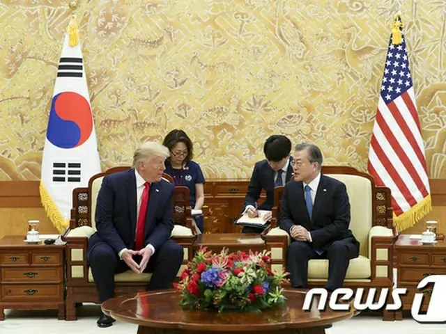 米韓首脳、65分間の会談＝「米朝同盟・非核化を協議」（画像:news1）