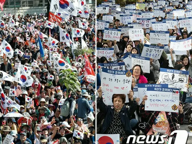 去る9日ソウルの汝矣島（ヨイド）で市民たちがそれぞれの集会を開き、“チョ法相支持”や“罷免”を求めている（提供:news1）