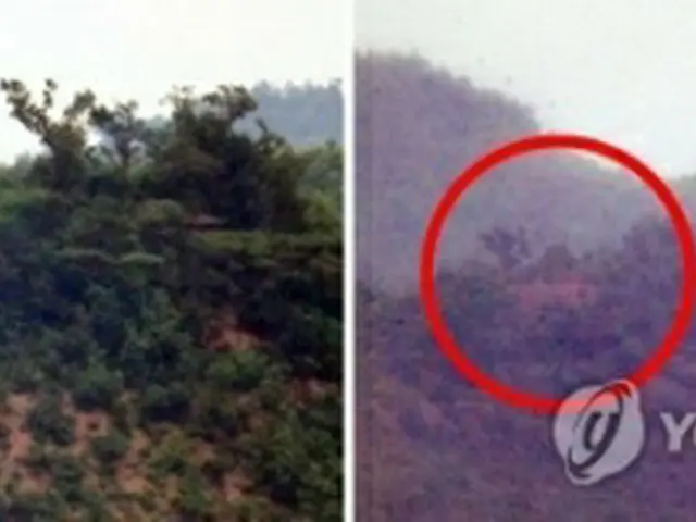 北西部の仁川市江華郡にある平和展望台から見た北朝鮮側の様子。２３日にあった拡声器（左）が２４日午前にはなくなっている＝２４日、仁川（聯合ニュース）