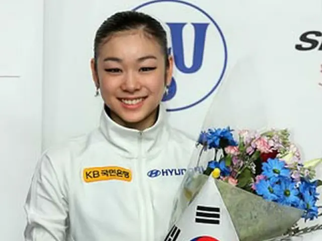笑顔でインタビューに応じたキム・ヨナ＝4日、バンクーバー（聯合ニュース）