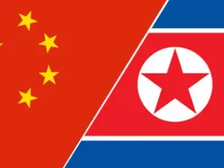 <W解説>北朝鮮の金総書記が訪中、随行員が取った不可解な行動とは？
