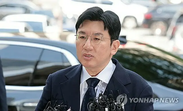今月１５日、ソウル警察庁に出頭した房氏＝（聯合ニュース）