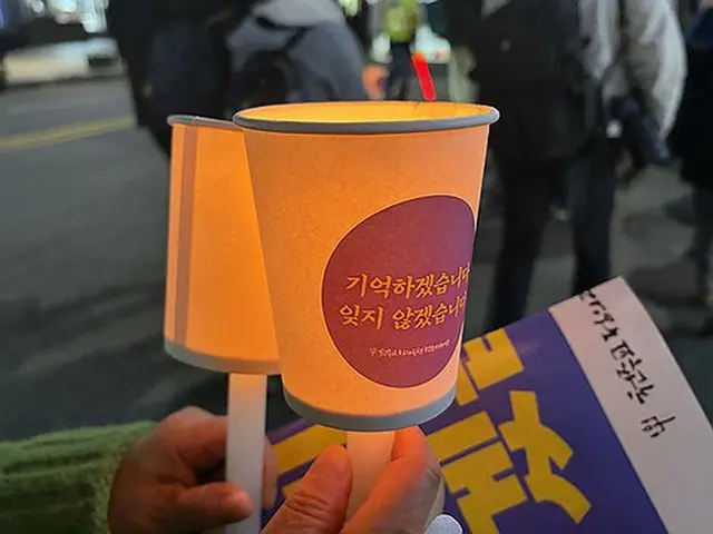 ２７日に梨泰院で宗教団体が開いた追悼行事＝（聯合ニュース）