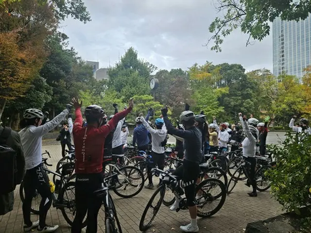 到着を喜ぶ参加者＝１１日、東京（聯合ニュース）