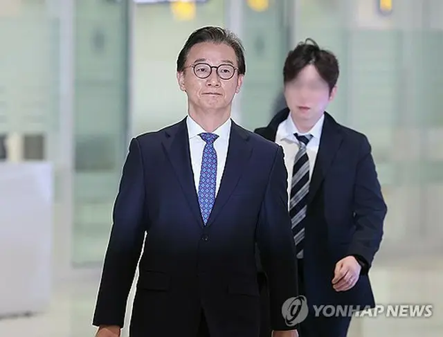 米国から帰国した田長官＝１１日、仁川（聯合ニュース）