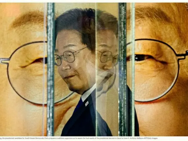 ６月４日に行われた大統領選の最終結果を待ちながら勝利演説の準備をする李大統領（米タイム誌ホームページより）＝（聯合ニュース）≪転載・転用禁止≫