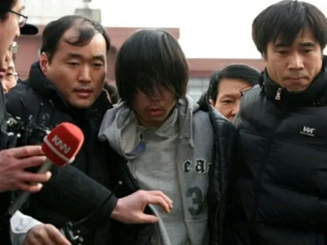 逮捕されたキム・ギルテ容疑者=10日、釜山(聯合ニュース)