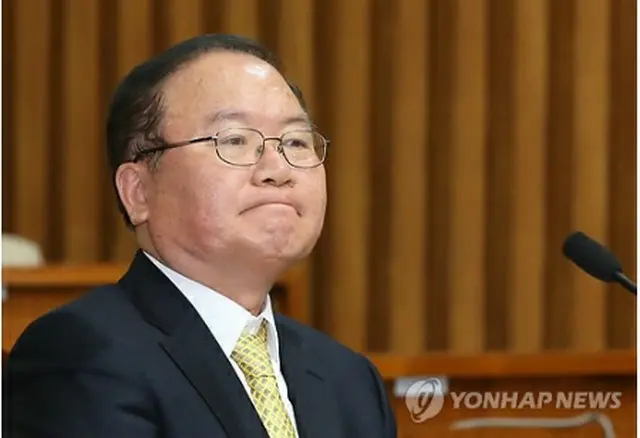 人事聴聞会で国会議員からの質問を受けている李東洽氏＝（聯合ニュース）