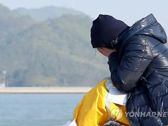 不明者の帰りを待つ家族