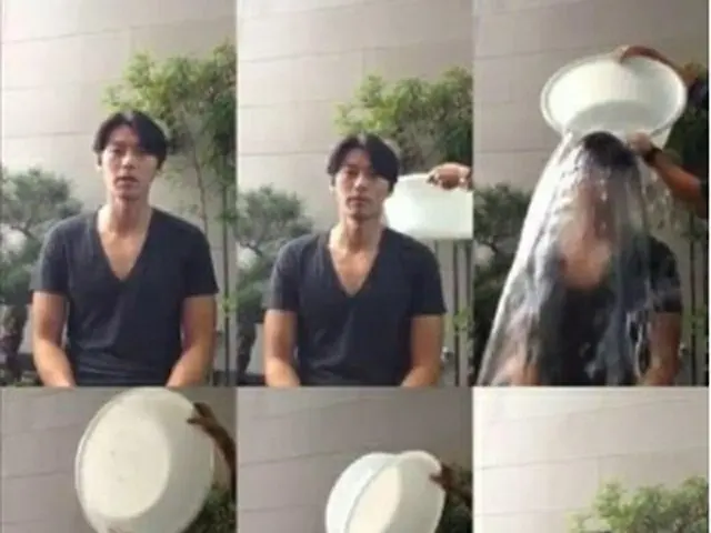 氷水をかぶるヒョンビンさん＝（聯合ニュース）