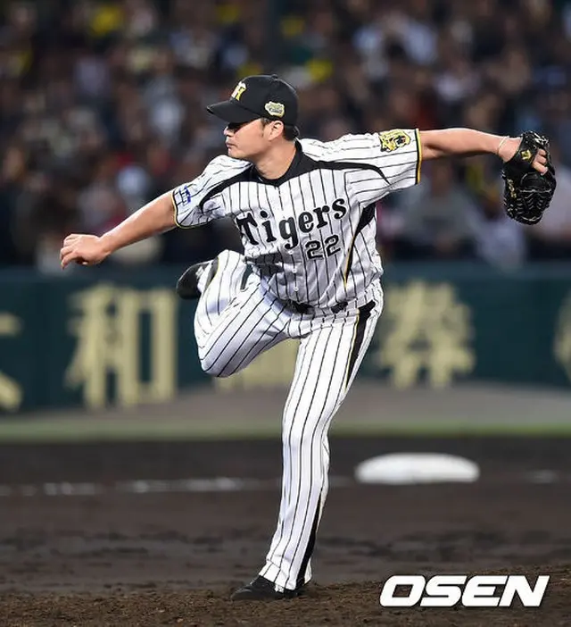 阪神の守護神、呉昇桓の日本シリーズデビューは、打者3人を17球という圧巻の投球で見事に先勝を決めた。（提供:OSEN）