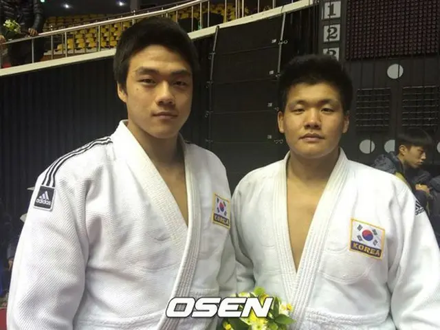 韓国重量級のダイナミックデュオ、クァク・ドンハンとチョ・グハムが柔道グランドスラム東京2014にて、そろって金メダルを獲得した。（提供:OSEN）