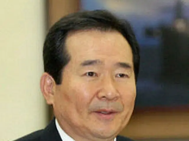 辞意を表明した産業資源部の丁世均長官=29日、ソウル(聯合)