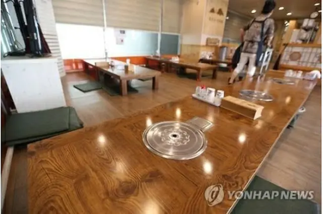 閑散とした飲食店＝（聯合ニュース）