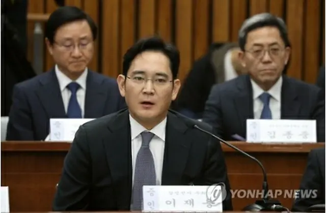 昨年１２月６日、国会で開かれた聴聞会で発言する李副会長＝（聯合ニュース）