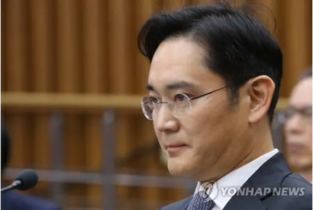 昨年１２月、国会の聴聞会に出席した李副会長＝（聯合ニュース）