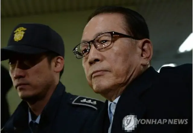 ２２日、特別検察官チームの聴取を受けるため出頭した金淇春元大統領秘書室長＝（聯合ニュース）