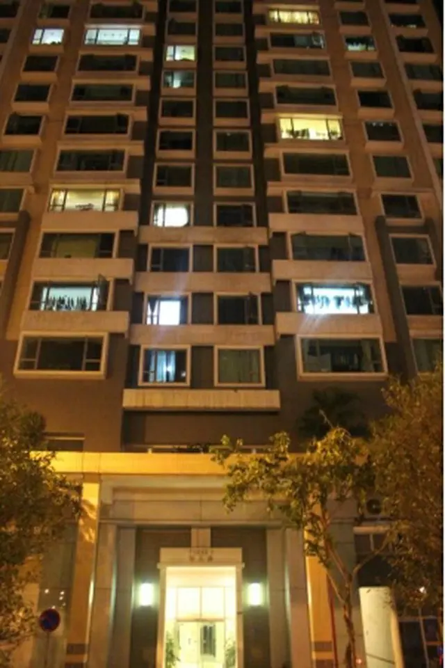 正男氏の妻と娘が住んでいたとされるマカオのマンション＝１５日、マカオ（聯合ニュース）