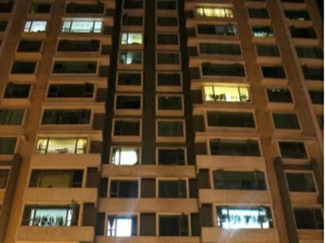 正男氏の妻と娘が住んでいたとされるマカオのマンション＝１５日、マカオ（聯合ニュース）