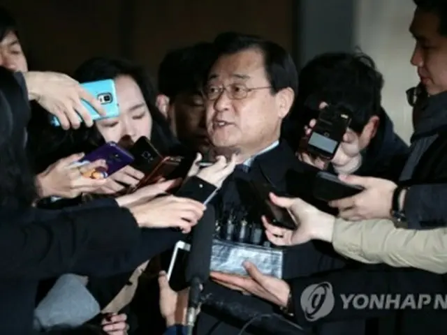 １３日、取り調べを受けるため検察に出頭した李丙ギ氏＝（聯合ニュース）