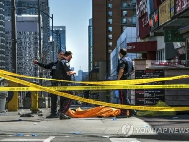 事件が起きたトロント市内＝２３日、トロント（ＡＰ＝聯合ニュース）