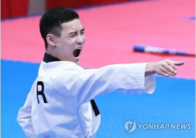 今大会、韓国勢初の金メダルに輝いたカン・ミンソン＝１９日、ジャカルタ（聯合ニュース）