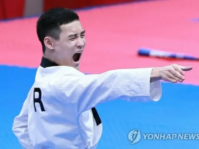 今大会、韓国勢初の金メダルに輝いたカン・ミンソン＝１９日、ジャカルタ（聯合ニュース）