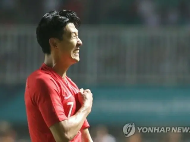 ジャカルタ・アジア大会サッカー男子決勝で優勝し、喜びを表す孫興民＝（聯合ニュース）