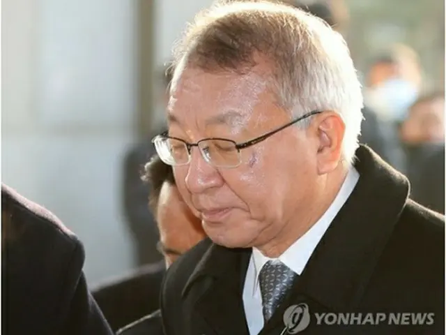 検察に出頭する梁氏＝１１日、ソウル（聯合ニュース）