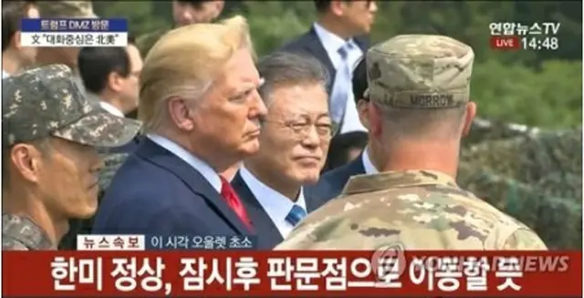 ＤＭＺにある軍の監視所を訪問した韓米首脳＝３０日、板門店（聯合ニュースＴＶ）