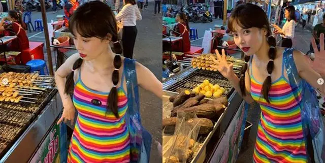 歌手ヒョナ、”玉ねぎヘア”も完ぺき消化！キュートなヘアスタイルで旅行中（画像:OSEN）