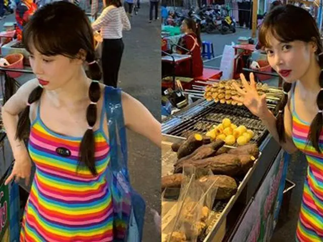 歌手ヒョナ、”玉ねぎヘア”も完ぺき消化！キュートなヘアスタイルで旅行中（画像:OSEN）