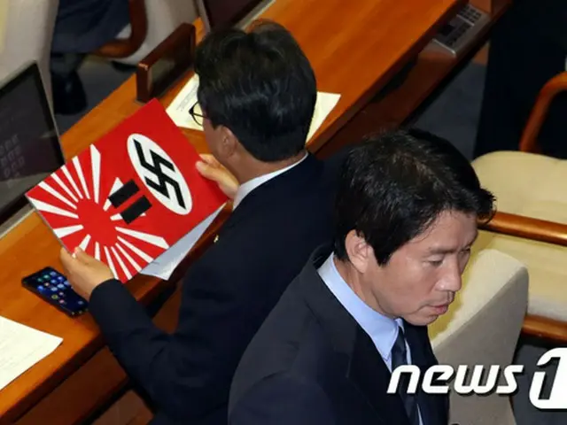 韓国国会が2020東京夏季オリンピック・夏季パラリンピックで競技場内に旭日旗搬入禁止措置を要求する決議案を30日、採択した。（提供:news1）