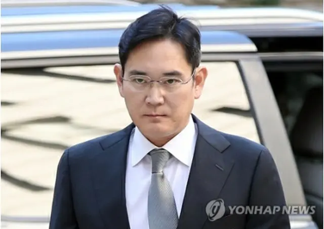 高裁に到着した李在鎔被告＝25日、ソウル（聯合ニュース）