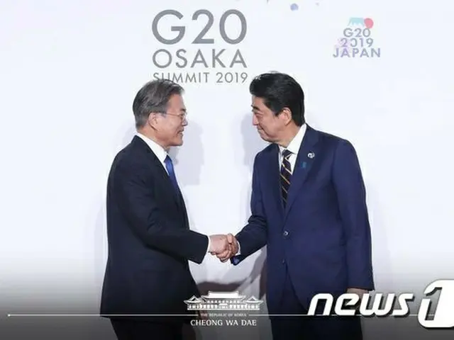 6月28日、G20での安倍晋三総理と文在寅（ムン・ジェイン）韓国大統領（提供:news1）