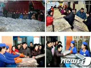 北メディア、金正恩氏の平壌住民への「魚のプレゼント」写真を公開