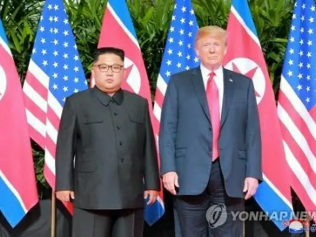 2018年6月12日、シンガポールで会談する金委員長とトランプ米大統領＝（聯合ニュース）≪転載・転用禁止≫
