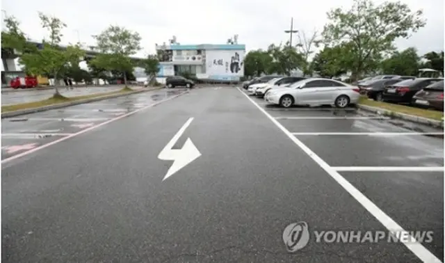 集団感染が発生した自動車同好会の集会が開かれた駐車場＝（聯合ニュース）