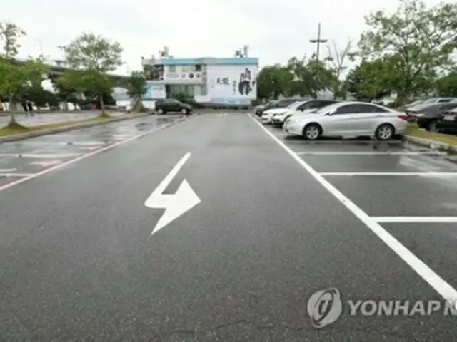 集団感染が発生した自動車同好会の集会が開かれた駐車場＝（聯合ニュース）